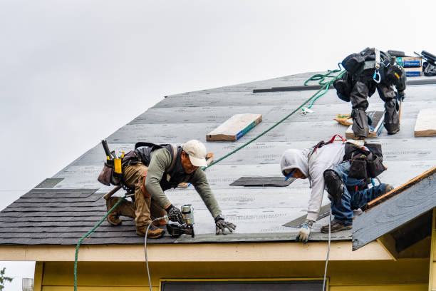 Professional Emergency Roof Repair technician working in Brattleboro, VT